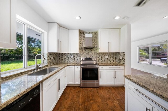 9221 SW 167th Ter, Palmetto Bay, FL 33157 - kitchen featuring stainless steel electric range oven, black dishwasher, wall chimney exhaust hood, white cabinetry, and light stone countertops