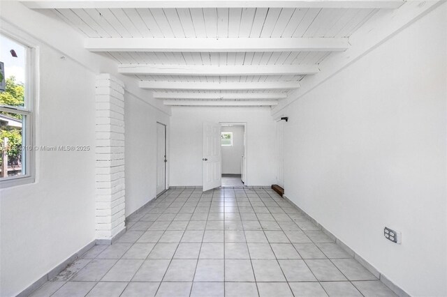9221 SW 167th Ter, Palmetto Bay, FL 33157 - corridor with a wood ceiling with exposed beams and light tile patterned flooring