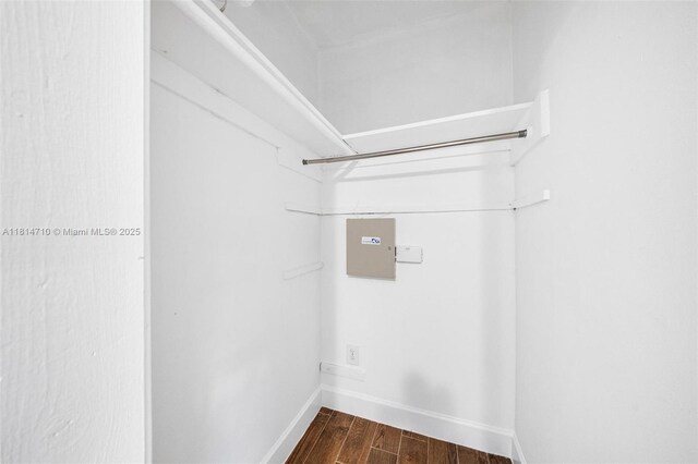 9221 SW 167th Ter, Palmetto Bay, FL 33157 - walk in closet featuring dark wood-style floors