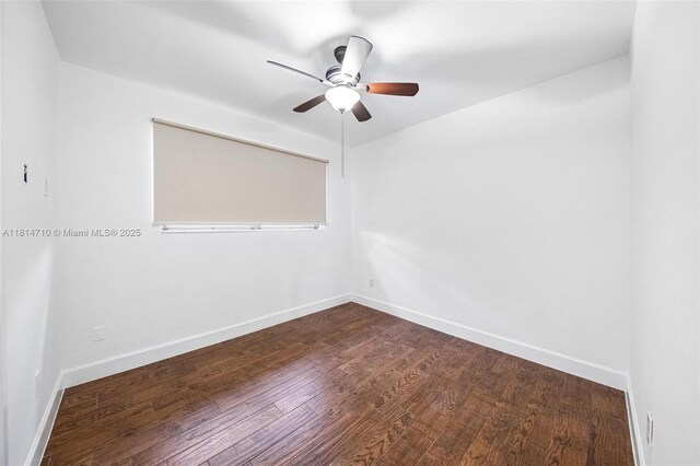 9221 SW 167th Ter, Palmetto Bay, FL 33157 - empty room featuring dark wood-type flooring and ceiling fan