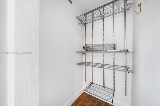 9221 SW 167th Ter, Palmetto Bay, FL 33157 - spacious closet featuring wood finished floors