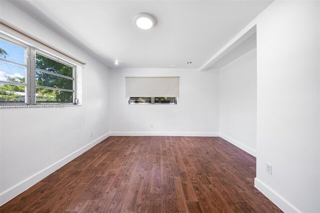 9221 SW 167th Ter, Palmetto Bay, FL 33157 - unfurnished room with dark wood-style floors and baseboards