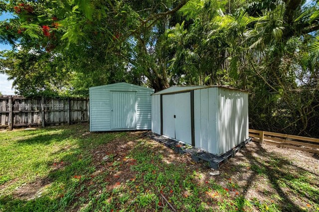 9221 SW 167th Ter, Palmetto Bay, FL 33157 - view of shed featuring a fenced backyard