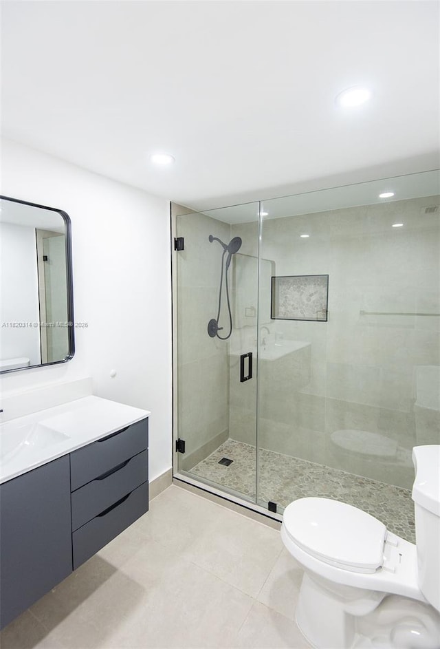 1750 NE 191st St Unit 100-1, Miami, FL 33179 - full bathroom with vanity, a shower stall, recessed lighting, and tile patterned flooring