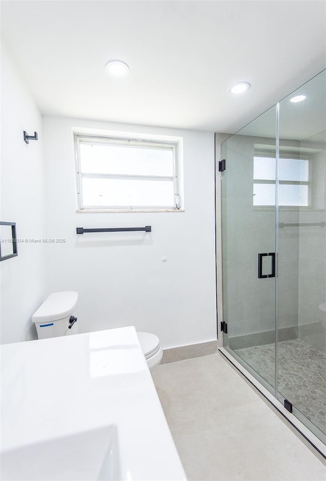 1750 NE 191st St Unit 100-1, Miami, FL 33179 - full bathroom with healthy amount of natural light, a shower stall, and recessed lighting