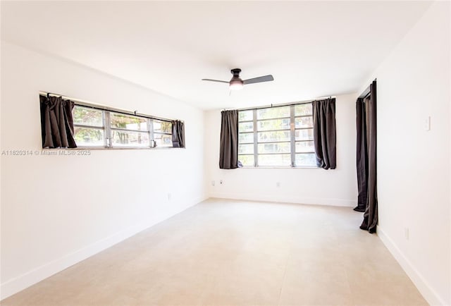 1750 NE 191st St Unit 100-1, Miami, FL 33179 - spare room with healthy amount of natural light and ceiling fan