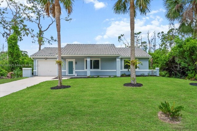 18125 Wintergarden Ave, Port Charlotte, FL 33948 - single story home featuring a garage, concrete driveway, a front yard, and stucco siding