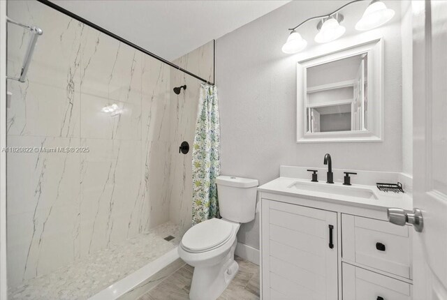 18125 Wintergarden Ave, Port Charlotte, FL 33948 - bathroom featuring a marble finish shower and vanity
