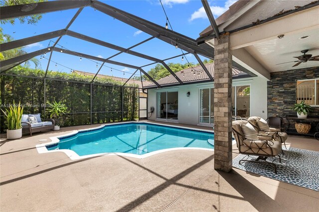1971 Landing Way, Weston, FL 33326 - swimming pool featuring a patio area, ceiling fan, an outdoor living space, and a lanai
