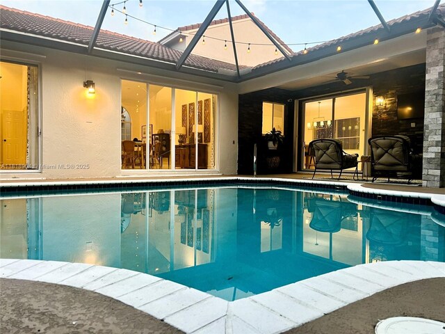 1971 Landing Way, Weston, FL 33326 - outdoor pool with ceiling fan, glass enclosure, and a patio area