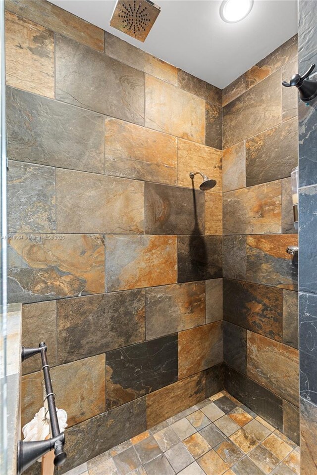1971 Landing Way, Weston, FL 33326 - bathroom featuring stone finish flooring and a tile shower