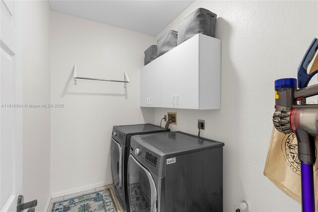 1971 Landing Way, Weston, FL 33326 - laundry room featuring cabinet space and washing machine and dryer
