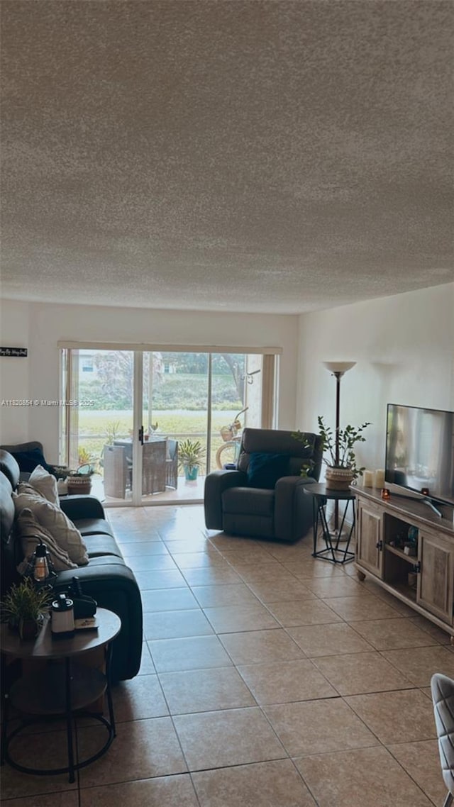 953 Coral Club Dr Unit 953, Coral Springs, FL 33071 - living room with light tile patterned floors and a textured ceiling