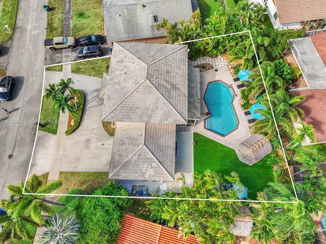 12821 SW 148th St Rd, Miami, FL 33186 - aerial overview of property's location with a pool and property boundaries highlighted
