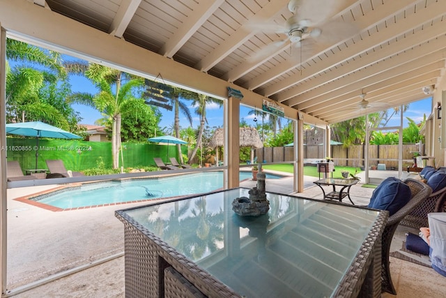 12821 SW 148th St Rd, Miami, FL 33186 - fenced backyard with a ceiling fan and a patio area