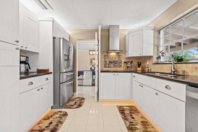 12821 SW 148th St Rd, Miami, FL 33186 - kitchen with stainless steel appliances, wall chimney exhaust hood, dark countertops, backsplash, and a textured ceiling