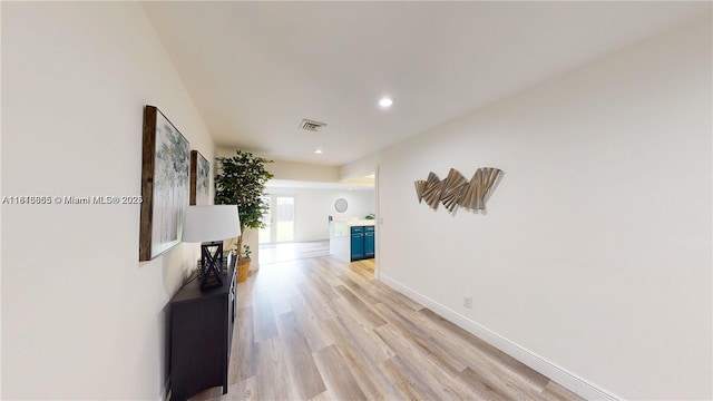 2116 NW 3rd Ave, Wilton Manors, FL 33311 - hall with light wood-style flooring and recessed lighting