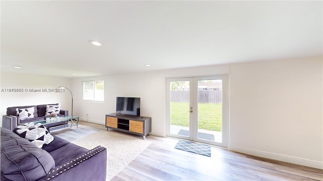 2116 NW 3rd Ave, Wilton Manors, FL 33311 - living area with light wood finished floors and recessed lighting