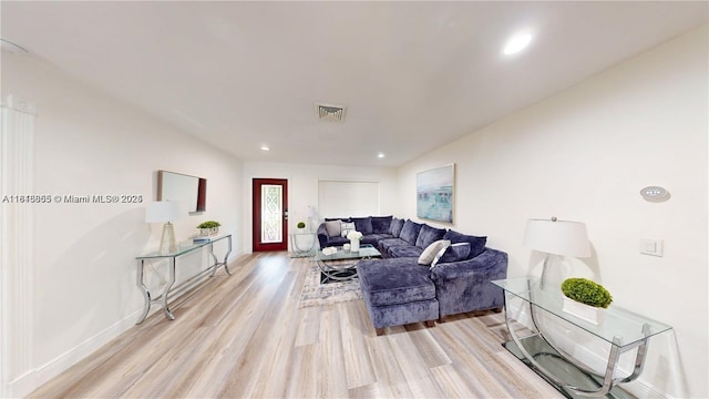 2116 NW 3rd Ave, Wilton Manors, FL 33311 - living room with light wood-style flooring and recessed lighting