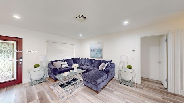 2116 NW 3rd Ave, Wilton Manors, FL 33311 - living room featuring light wood-style floors and recessed lighting