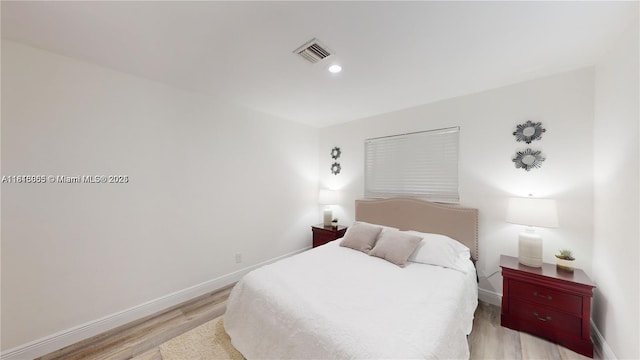 2116 NW 3rd Ave, Wilton Manors, FL 33311 - bedroom with light wood-style floors