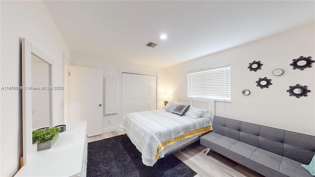 2116 NW 3rd Ave, Wilton Manors, FL 33311 - bedroom featuring light wood-style flooring, a closet, and recessed lighting