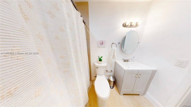 2116 NW 3rd Ave, Wilton Manors, FL 33311 - bathroom featuring vanity, wood finished floors, and curtained shower