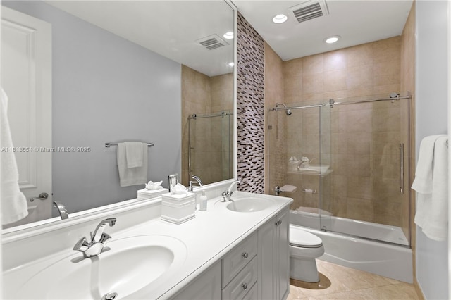 10985 Canary Island Ct, Plantation, FL 33324 - bathroom featuring double vanity, shower / bath combination with glass door, tile patterned floors, and recessed lighting