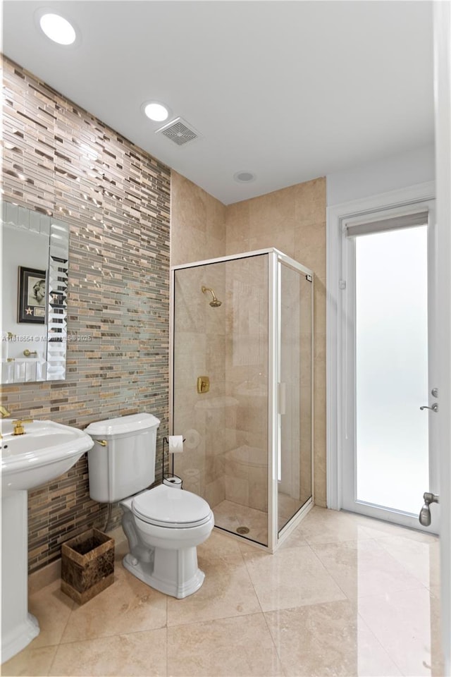 10985 Canary Island Ct, Plantation, FL 33324 - full bath with tile walls, a shower stall, and tile patterned flooring