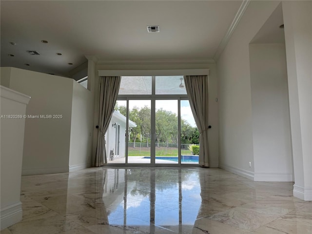 1290 Ginger Cir, Weston, FL 33326 - empty room with light marble finish floors and ornamental molding