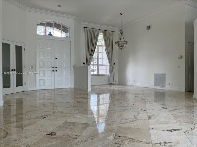 1290 Ginger Cir, Weston, FL 33326 - entryway with marble tiled flooring, ornamental molding, french doors, and a high ceiling