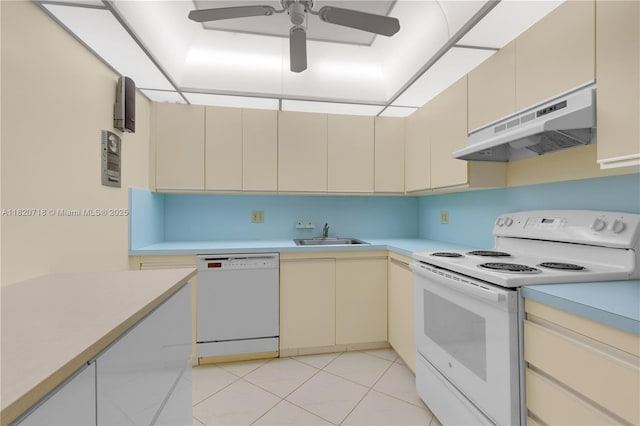 2500 Parkview Dr Unit 1717, Hallandale Beach, FL 33009 - kitchen with white appliances, under cabinet range hood, cream cabinets, light countertops, and a ceiling fan