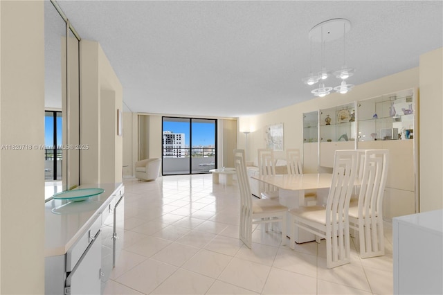 2500 Parkview Dr Unit 1717, Hallandale Beach, FL 33009 - dining room featuring light tile patterned floors and expansive windows