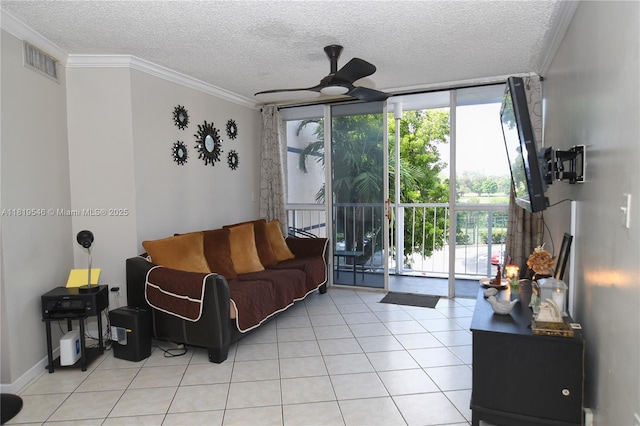 7125 NW 186th St Unit B311, Hialeah, FL 33015 - living area featuring a wall of windows, a ceiling fan, a textured ceiling, crown molding, and light tile patterned floors