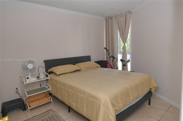 7125 NW 186th St Unit B311, Hialeah, FL 33015 - bedroom featuring tile patterned flooring, a textured ceiling, and ornamental molding