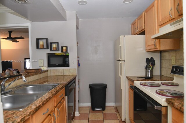 7125 NW 186th St Unit B311, Hialeah, FL 33015 - kitchen with black appliances, under cabinet range hood, a ceiling fan, and light tile patterned floors