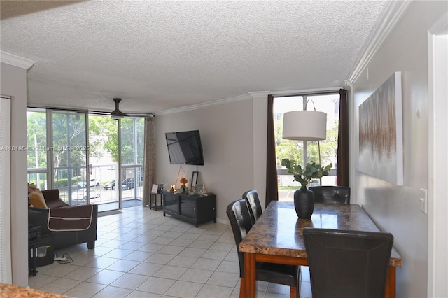7125 NW 186th St Unit B311, Hialeah, FL 33015 - dining room featuring expansive windows, a textured ceiling, crown molding, light tile patterned floors, and a ceiling fan