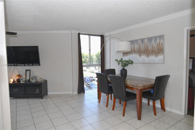 7125 NW 186th St Unit B311, Hialeah, FL 33015 - dining space with crown molding, a textured ceiling, and light tile patterned flooring