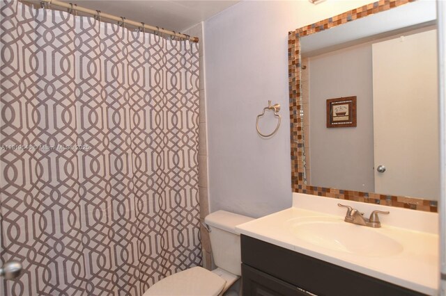 7125 NW 186th St Unit B311, Hialeah, FL 33015 - full bathroom with vanity and a shower with shower curtain
