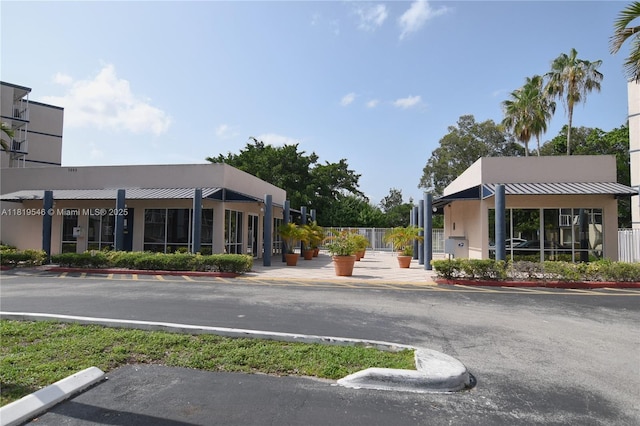 7125 NW 186th St Unit B311, Hialeah, FL 33015 - view of asphalt street with curbs and sidewalks