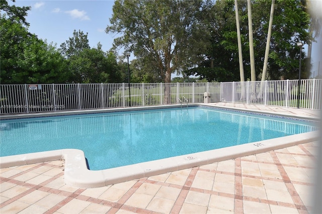 7125 NW 186th St Unit B311, Hialeah, FL 33015 - community pool featuring a patio area