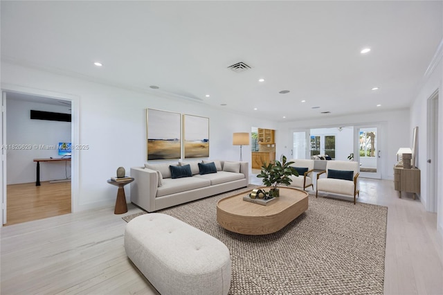 2085 Ixora Rd, North Miami, FL 33181 - living room with light wood-style floors and recessed lighting