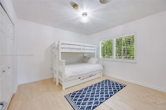 2085 Ixora Rd, North Miami, FL 33181 - bedroom with wood finished floors and a closet