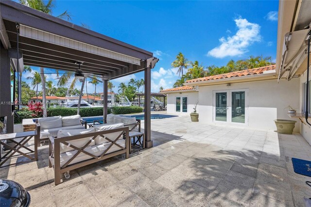 2085 Ixora Rd, North Miami, FL 33181 - view of patio with french doors, an outdoor living space, an outdoor pool, and a pergola