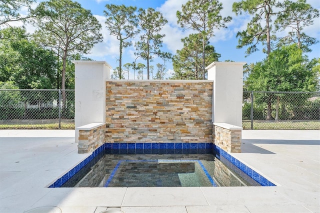 17038 N 61st Pl N, Loxahatchee, FL 33470 - view of swimming pool with an in-ground hot tub