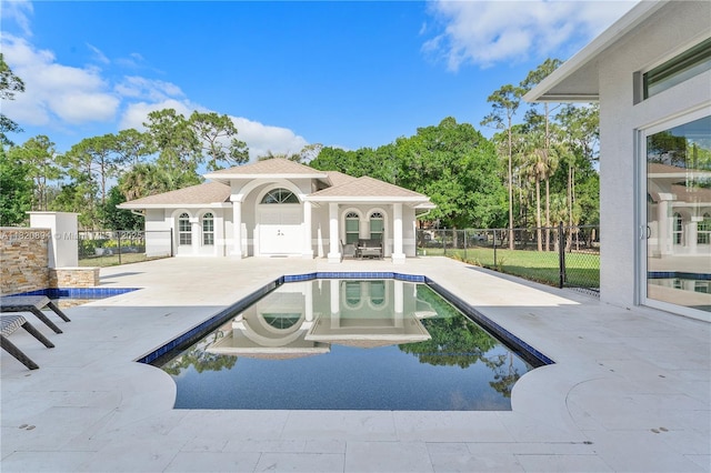 17038 N 61st Pl N, Loxahatchee, FL 33470 - view of swimming pool featuring a patio area