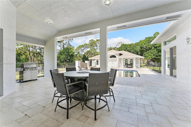 17038 N 61st Pl N, Loxahatchee, FL 33470 - view of patio featuring outdoor dining area and area for grilling