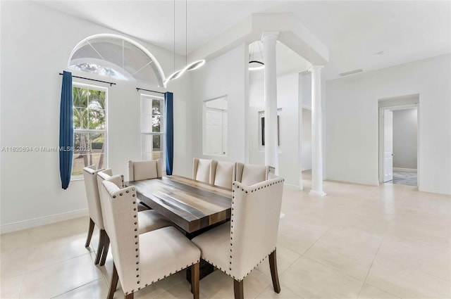 17038 N 61st Pl N, Loxahatchee, FL 33470 - dining room with decorative columns and light tile patterned floors