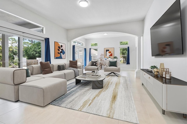 17038 N 61st Pl N, Loxahatchee, FL 33470 - living area with arched walkways, light tile patterned floors, and ornate columns