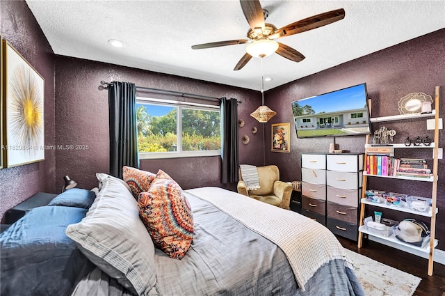 651 E Evanston Cir, Fort Lauderdale, FL 33312 - bedroom with a textured wall, wood finished floors, a textured ceiling, and ceiling fan